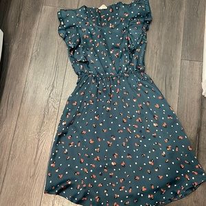 Betsey’s Boutique Shop short sleeve, teal dress with multi colored dots. Size S